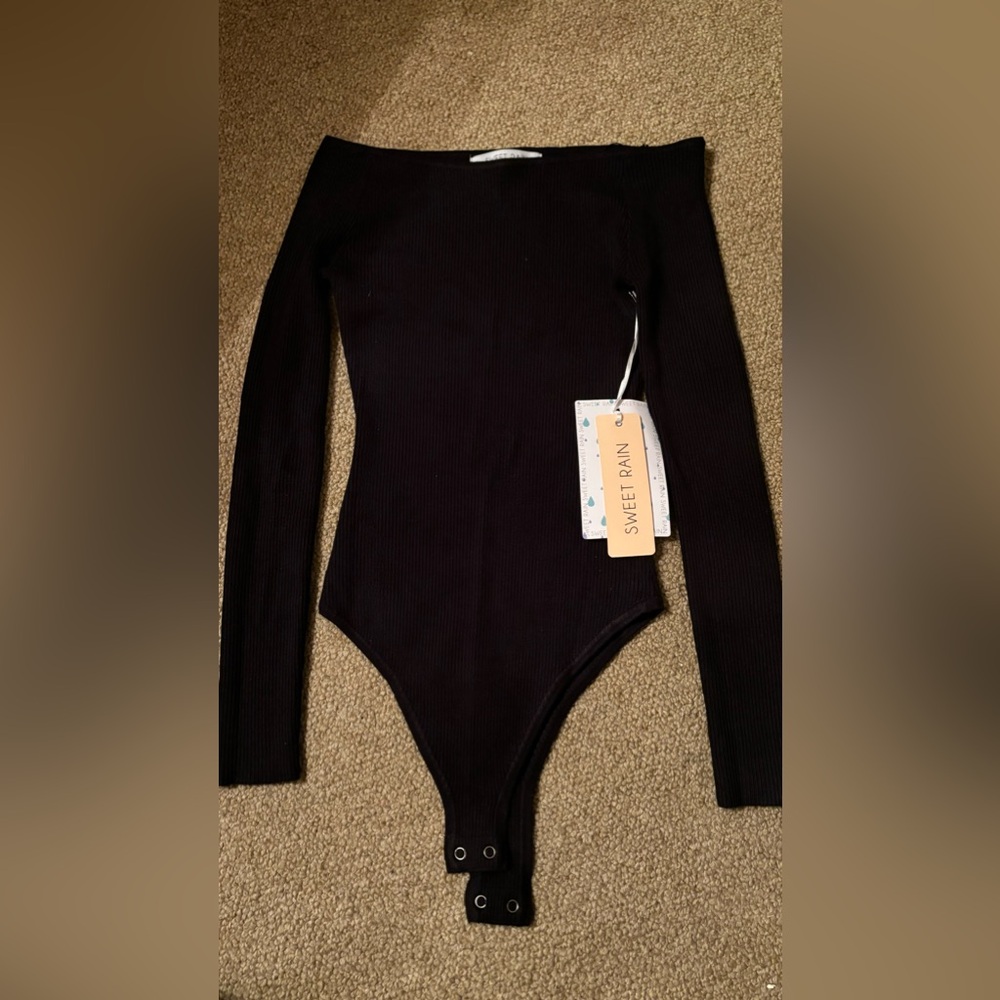 Black off-the-shoulder long sleeve bodysuit.